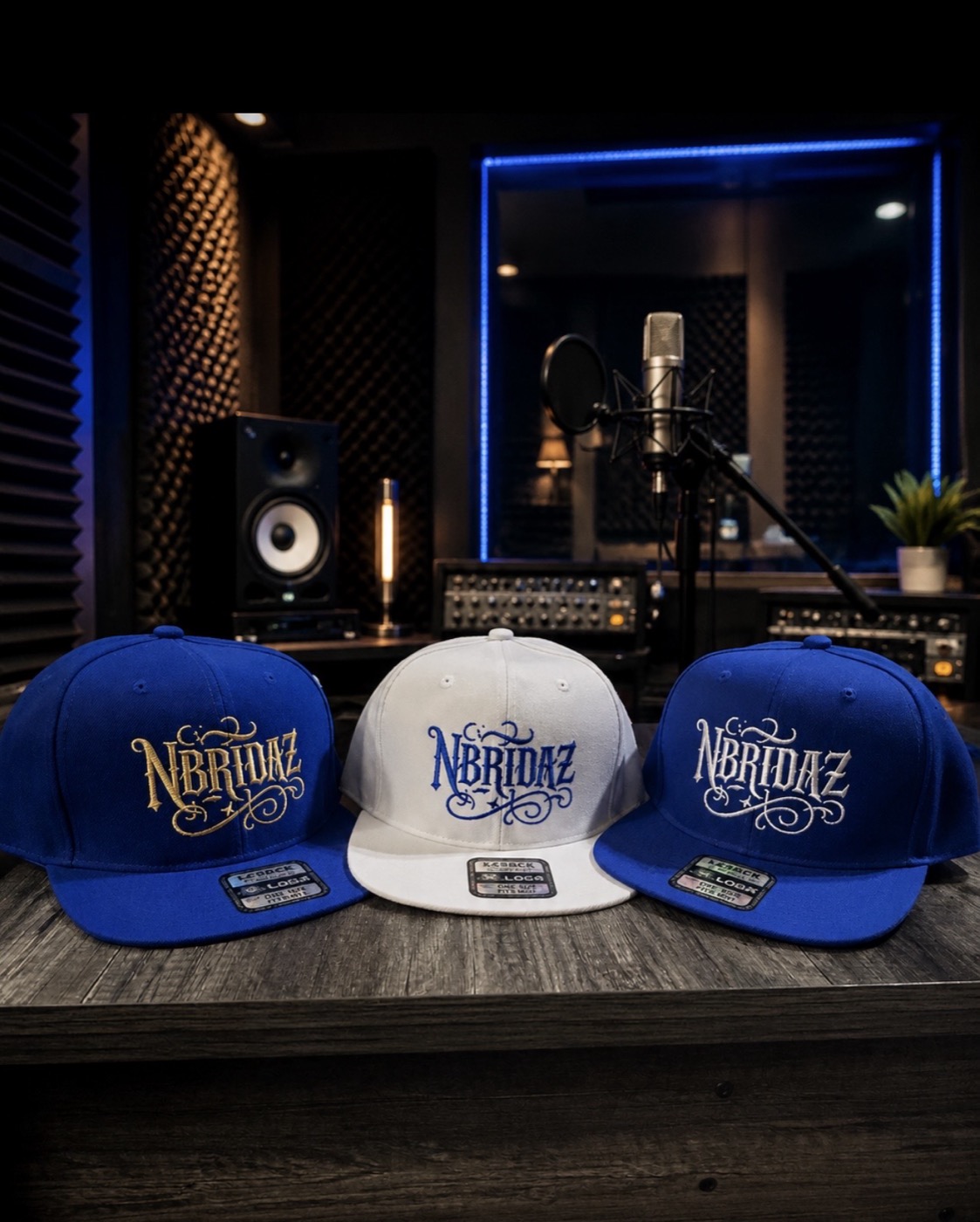 Royal blue and white NBridaz snapbacks with ornate lettering